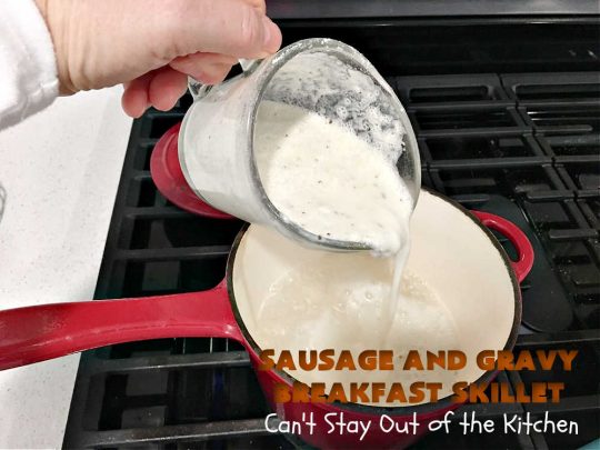 Sausage and Gravy Breakfast Skillet | Can't Stay Out of the Kitchen | this fantastic #BreakfastSkillet includes #SausageAndGravy which offers a down-home #southern #breakfast you're sure to love. This one includes #HashBrowns, both #Cheddar & #MontereyJack cheeses and sunny-side-up #eggs. Hearty, filling & so satisfying. Great for a weekend, company or #HolidayBreakfast. #holiday #FathersDay #FathersDayBreakfast #sausage #SausageAndGravyBreakfastSkillet