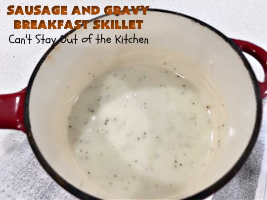 Sausage and Gravy Breakfast Skillet | Can't Stay Out of the Kitchen | this fantastic #BreakfastSkillet includes #SausageAndGravy which offers a down-home #southern #breakfast you're sure to love. This one includes #HashBrowns, both #Cheddar & #MontereyJack cheeses and sunny-side-up #eggs. Hearty, filling & so satisfying. Great for a weekend, company or #HolidayBreakfast. #holiday #FathersDay #FathersDayBreakfast #sausage #SausageAndGravyBreakfastSkillet