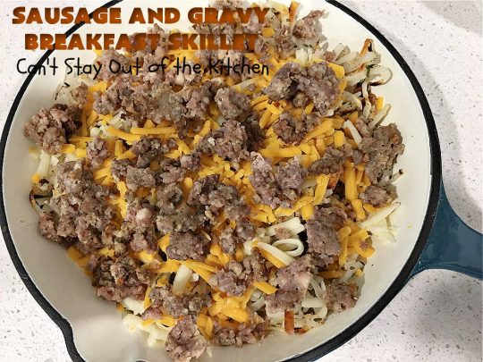 Sausage and Gravy Breakfast Skillet | Can't Stay Out of the Kitchen | this fantastic #BreakfastSkillet includes #SausageAndGravy which offers a down-home #southern #breakfast you're sure to love. This one includes #HashBrowns, both #Cheddar & #MontereyJack cheeses and sunny-side-up #eggs. Hearty, filling & so satisfying. Great for a weekend, company or #HolidayBreakfast. #holiday #FathersDay #FathersDayBreakfast #sausage #SausageAndGravyBreakfastSkillet