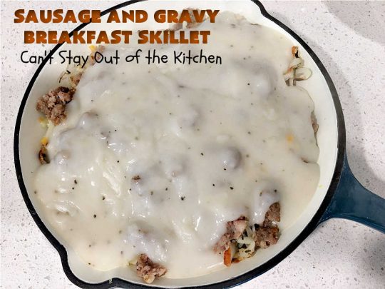 Sausage and Gravy Breakfast Skillet | Can't Stay Out of the Kitchen | this fantastic #BreakfastSkillet includes #SausageAndGravy which offers a down-home #southern #breakfast you're sure to love. This one includes #HashBrowns, both #Cheddar & #MontereyJack cheeses and sunny-side-up #eggs. Hearty, filling & so satisfying. Great for a weekend, company or #HolidayBreakfast. #holiday #FathersDay #FathersDayBreakfast #sausage #SausageAndGravyBreakfastSkillet