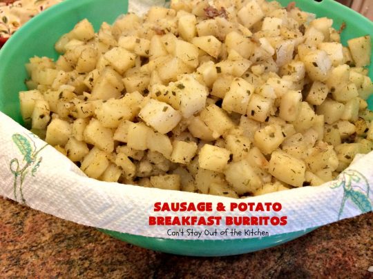 Sausage and Potato Breakfast Burritos | Can't Stay Out of the Kitchen | These fabulous #BreakfastBurritos can be made in advance. Then just microwave them before you leave for work. They include #sausage, #CheddarCheese, #eggs & seasoned #potatoes. Serve with your favorite #salsa, #PicoDeGallo or even #Guacamole! We love this amazing #TexMex #breakfast. #tortillas #SausageAndPotatoBreakfastBurritos