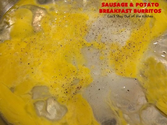 Sausage and Potato Breakfast Burritos | Can't Stay Out of the Kitchen | These fabulous #BreakfastBurritos can be made in advance. Then just microwave them before you leave for work. They include #sausage, #CheddarCheese, #eggs & seasoned #potatoes. Serve with your favorite #salsa, #PicoDeGallo or even #Guacamole! We love this amazing #TexMex #breakfast. #tortillas #SausageAndPotatoBreakfastBurritos