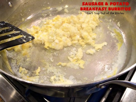 Sausage and Potato Breakfast Burritos | Can't Stay Out of the Kitchen | These fabulous #BreakfastBurritos can be made in advance. Then just microwave them before you leave for work. They include #sausage, #CheddarCheese, #eggs & seasoned #potatoes. Serve with your favorite #salsa, #PicoDeGallo or even #Guacamole! We love this amazing #TexMex #breakfast. #tortillas #SausageAndPotatoBreakfastBurritos