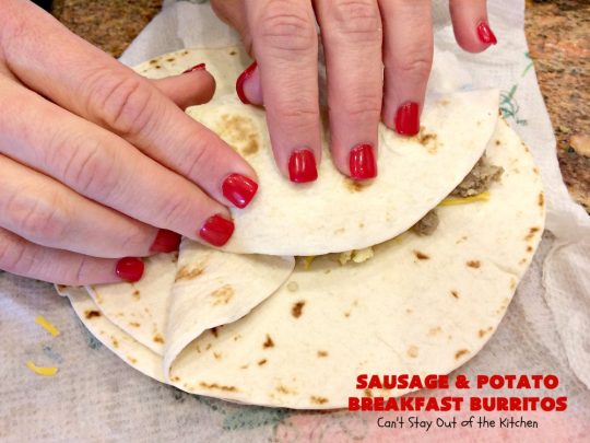 Sausage and Potato Breakfast Burritos | Can't Stay Out of the Kitchen | These fabulous #BreakfastBurritos can be made in advance. Then just microwave them before you leave for work. They include #sausage, #CheddarCheese, #eggs & seasoned #potatoes. Serve with your favorite #salsa, #PicoDeGallo or even #Guacamole! We love this amazing #TexMex #breakfast. #tortillas #SausageAndPotatoBreakfastBurritos