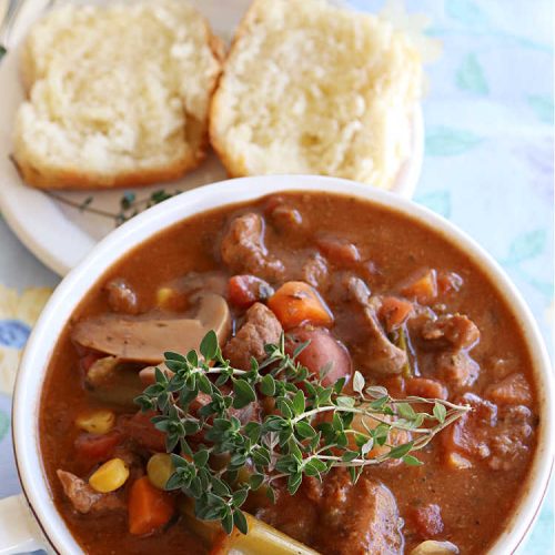 Slow Cooker Beef Stew | Can't Stay Out of the Kitchen | #SlowCookerBeefStew is a great, lazy day entree for cool, fall nights. It's especially good served with #HomemadeRolls. Tossing all the ingredients into the #SlowCooker makes this recipe so much easier on days when you're short on time. #BeefStew #beef, #potatoes, #carrots, #tomatoes #recipe #EasyBeefStewRecipe