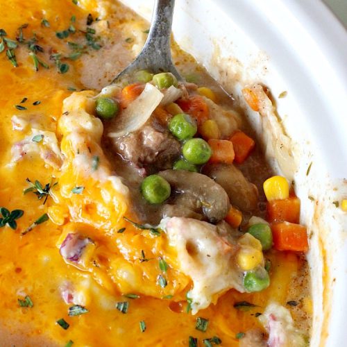 Slow Cooker Shepherd's Pie | Can't Stay Out of the Kitchen | this awesome #ShepherdsPie #recipe will have you licking your chops from the first bite! It's irresistible comfort food & easier to make since it's made in the #SlowCooker. Wonderful for company or family dinners. #beef #cheese #peas #corn #carrots #RedPotatoes #crockpot #SlowCookerShepherdsPie #BestShepherdsPie #FavoriteShepherdsPie