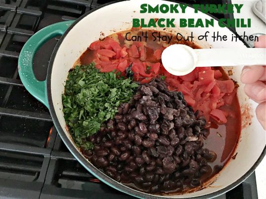 Smoky Turkey Black Bean Chili | Can't Stay Out of the Kitchen | this fantastic #chili #recipe includes #BlackBeans, #FireRoastedTomatoes, #bacon, #turkey, #cilantro #jalapeno & #ChipotlePeppers & wonderful seasonings that provide mouthwatering flavor. You can make this mild or spicy hot--whatever you desire. Great for #tailgating parties & potlucks. #BlackBeanChili #TurkeyChili #SmokyTurkeyBlackBeanChili #Fritos #CheddarCheese #ChiliWithBacon
