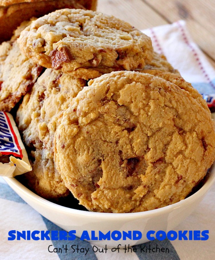 Snickers Almond Cookies | Can't Stay Out of the Kitchen | these scrumptious #cookies will cure any sweet tooth craving. This #dessert uses #SnickersAlmondBars in the dough. So they're filled with #chocolate & #almonds. Every bite will have you salivating. #tailgating #holiday #baking #HolidayBaking #HolidayDessert #SnickersDessert #ChocolateDessert #AlmondDessert #ChristmasCookieExchange #Snickers #SnickersBars #SnickersAlmondCookies