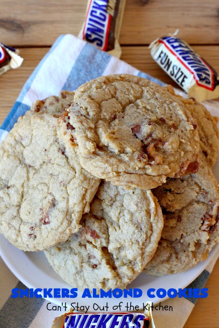 Snickers Almond Cookies | Can't Stay Out of the Kitchen | these scrumptious #cookies will cure any sweet tooth craving. This #dessert uses #SnickersAlmondBars in the dough. So they're filled with #chocolate & #almonds. Every bite will have you salivating. #tailgating #holiday #baking #HolidayBaking #HolidayDessert #SnickersDessert #ChocolateDessert #AlmondDessert #ChristmasCookieExchange #Snickers #SnickersBars #SnickersAlmondCookies