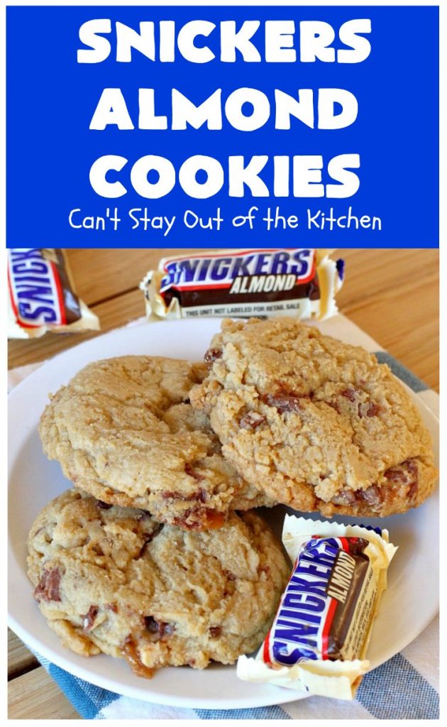 Snickers Almond Cookies | Can't Stay Out of the Kitchen | these scrumptious #cookies will cure any sweet tooth craving. This #dessert uses #SnickersAlmondBars in the dough. So they're filled with #chocolate & #almonds. Every bite will have you salivating. #tailgating #holiday #baking #HolidayBaking #HolidayDessert #SnickersDessert #ChocolateDessert #AlmondDessert #ChristmasCookieExchange #Snickers #SnickersBars #SnickersAlmondCookies