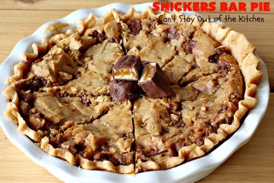 Snickers Bar Pie | Can't Stay Out of the Kitchen | this outrageously irresistible #pie is filled with #SnickersBars. Every bite contains #chocolate, #caramel & #peanuts. Fantastic for special occasions & #holidays like #ValentinesDay. #CaramelDessert #ChocolateDessert #HolidayDessert #PeanutButterDessert #SnickersDessert #SnickersCandyBars #SnickersBarPie #dessert