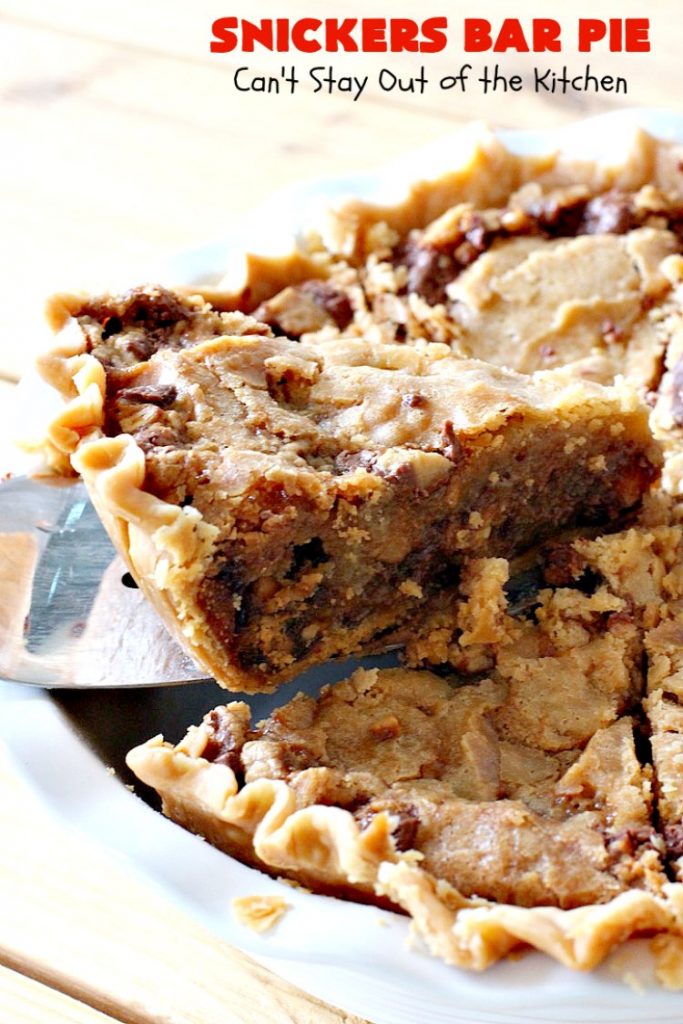 Snickers Bar Pie | Can't Stay Out of the Kitchen | this outrageously irresistible #pie is filled with #SnickersBars. Every bite contains #chocolate, #caramel & #peanuts. Fantastic for special occasions & #holidays like #ValentinesDay. #CaramelDessert #ChocolateDessert #HolidayDessert #PeanutButterDessert #SnickersDessert #SnickersCandyBars #SnickersBarPie #dessert