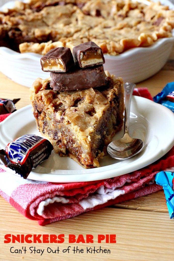 Snickers Bar Pie | Can't Stay Out of the Kitchen | this outrageously irresistible #pie is filled with #SnickersBars. Every bite contains #chocolate, #caramel & #peanuts. Fantastic for special occasions & #holidays like #ValentinesDay. #CaramelDessert #ChocolateDessert #HolidayDessert #PeanutButterDessert #SnickersDessert #SnickersCandyBars #SnickersBarPie #dessert