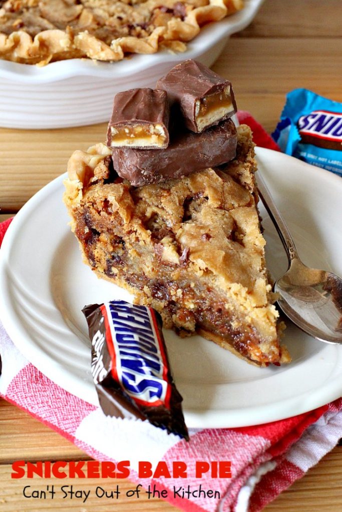 Snickers Bar Pie | Can't Stay Out of the Kitchen | this outrageously irresistible #pie is filled with #SnickersBars. Every bite contains #chocolate, #caramel & #peanuts. Fantastic for special occasions & #holidays like #ValentinesDay. #CaramelDessert #ChocolateDessert #HolidayDessert #PeanutButterDessert #SnickersDessert #SnickersCandyBars #SnickersBarPie #dessert