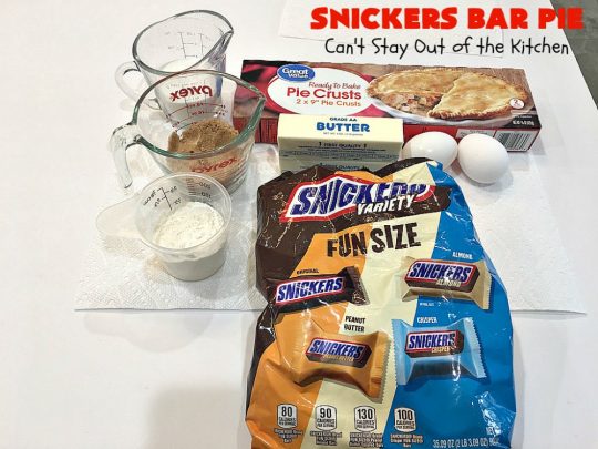 Snickers Bar Pie | Can't Stay Out of the Kitchen | this outrageously irresistible #pie is filled with #SnickersBars. Every bite contains #chocolate, #caramel & #peanuts. Fantastic for special occasions & #holidays like #ValentinesDay. #CaramelDessert #ChocolateDessert #HolidayDessert #PeanutButterDessert #SnickersDessert #SnickersCandyBars #SnickersBarPie #dessert
