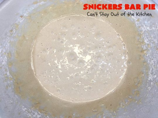 Snickers Bar Pie | Can't Stay Out of the Kitchen | this outrageously irresistible #pie is filled with #SnickersBars. Every bite contains #chocolate, #caramel & #peanuts. Fantastic for special occasions & #holidays like #ValentinesDay. #CaramelDessert #ChocolateDessert #HolidayDessert #PeanutButterDessert #SnickersDessert #SnickersCandyBars #SnickersBarPie #dessert