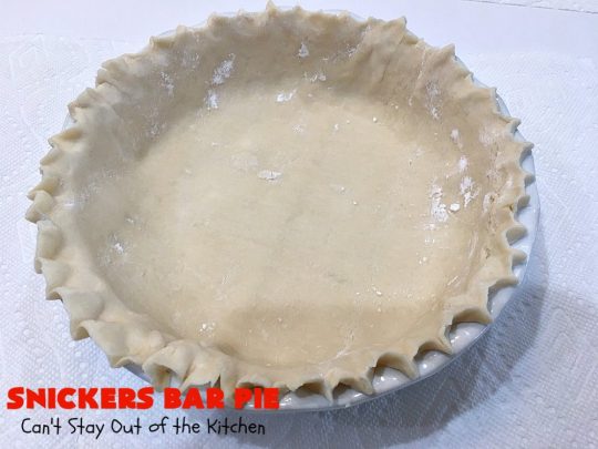 Snickers Bar Pie | Can't Stay Out of the Kitchen | this outrageously irresistible #pie is filled with #SnickersBars. Every bite contains #chocolate, #caramel & #peanuts. Fantastic for special occasions & #holidays like #ValentinesDay. #CaramelDessert #ChocolateDessert #HolidayDessert #PeanutButterDessert #SnickersDessert #SnickersCandyBars #SnickersBarPie #dessert