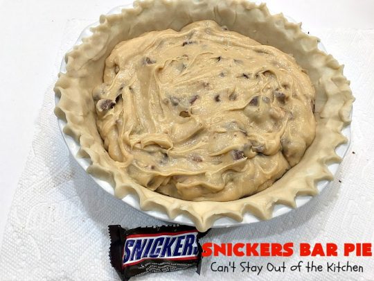 Snickers Bar Pie | Can't Stay Out of the Kitchen | this outrageously irresistible #pie is filled with #SnickersBars. Every bite contains #chocolate, #caramel & #peanuts. Fantastic for special occasions & #holidays like #ValentinesDay. #CaramelDessert #ChocolateDessert #HolidayDessert #PeanutButterDessert #SnickersDessert #SnickersCandyBars #SnickersBarPie #dessert
