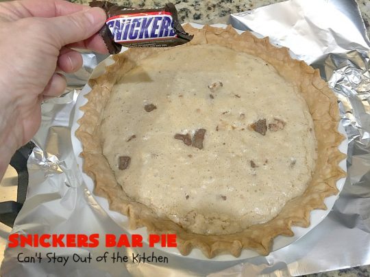Snickers Bar Pie | Can't Stay Out of the Kitchen | this outrageously irresistible #pie is filled with #SnickersBars. Every bite contains #chocolate, #caramel & #peanuts. Fantastic for special occasions & #holidays like #ValentinesDay. #CaramelDessert #ChocolateDessert #HolidayDessert #PeanutButterDessert #SnickersDessert #SnickersCandyBars #SnickersBarPie #dessert