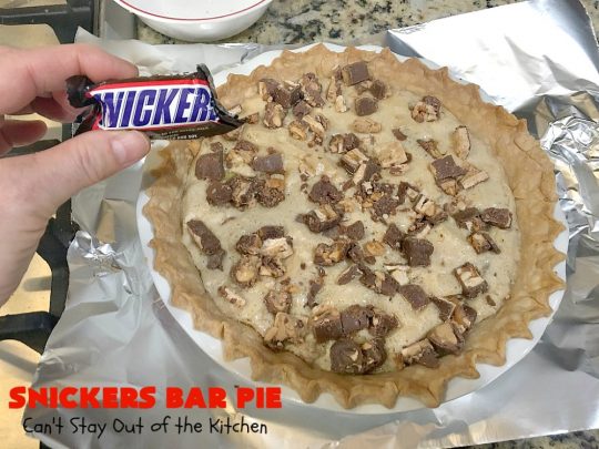 Snickers Bar Pie | Can't Stay Out of the Kitchen | this outrageously irresistible #pie is filled with #SnickersBars. Every bite contains #chocolate, #caramel & #peanuts. Fantastic for special occasions & #holidays like #ValentinesDay. #CaramelDessert #ChocolateDessert #HolidayDessert #PeanutButterDessert #SnickersDessert #SnickersCandyBars #SnickersBarPie #dessert