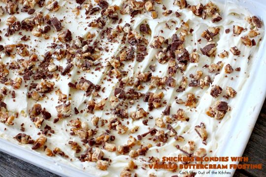 Snickers Blondies with Vanilla Buttercream Frosting | Can't Stay Out of the Kitchen | these outrageous #brownies are divine! The frosting is oh, so heavenly. One bite and you'll be drooling! #dessert #snickers #chocolate