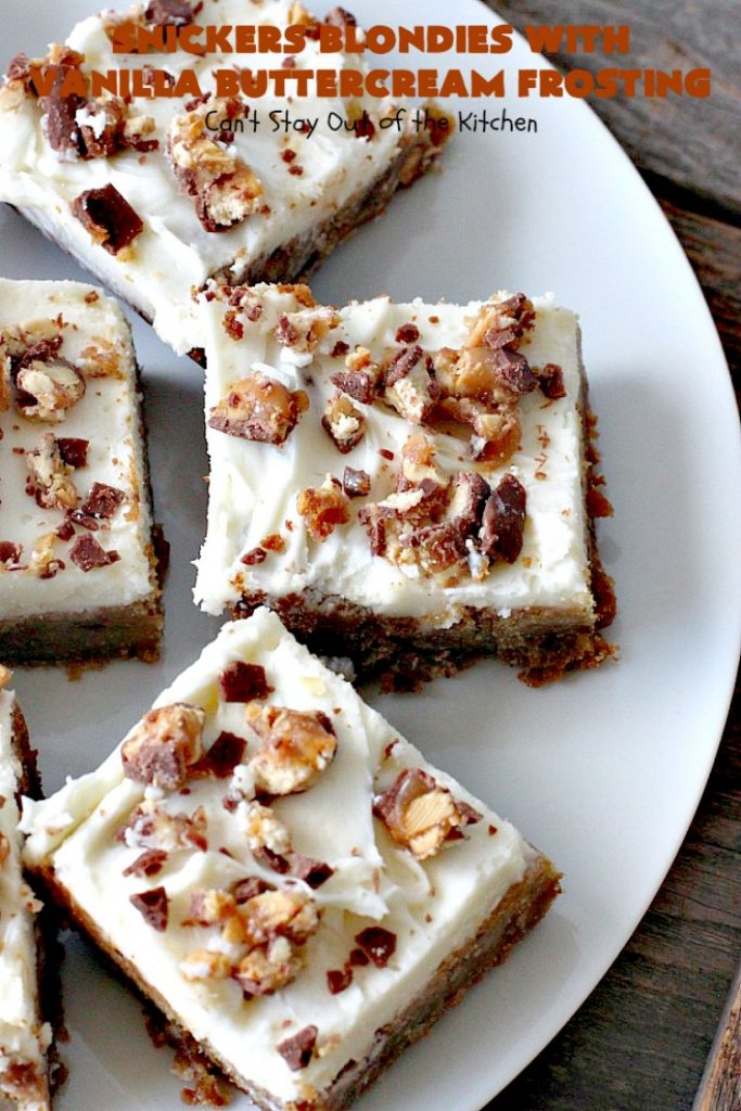 Snickers Blondies with Vanilla Buttercream Frosting | Can't Stay Out of the Kitchen | these outrageous #brownies are divine! The frosting is oh, so heavenly. One bite and you'll be drooling! #dessert #snickers #chocolate