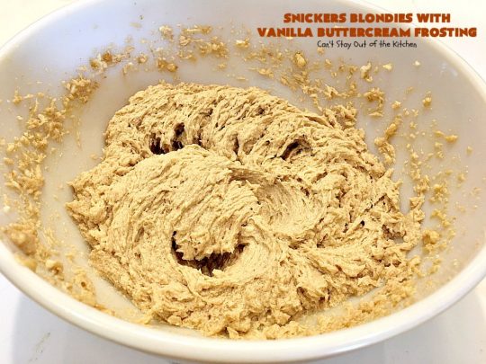 Snickers Blondies with Vanilla Buttercream Frosting | Can't Stay Out of the Kitchen | these outrageous #brownies are divine! The frosting is oh, so heavenly. One bite and you'll be drooling! #dessert #snickers #chocolate