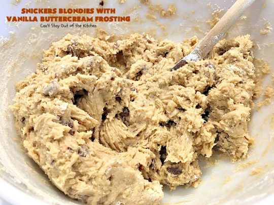 Snickers Blondies with Vanilla Buttercream Frosting | Can't Stay Out of the Kitchen | these outrageous #brownies are divine! The frosting is oh, so heavenly. One bite and you'll be drooling! #dessert #snickers #chocolate