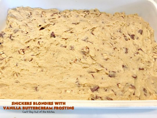 Snickers Blondies with Vanilla Buttercream Frosting | Can't Stay Out of the Kitchen | these outrageous #brownies are divine! The frosting is oh, so heavenly. One bite and you'll be drooling! #dessert #snickers #chocolate
