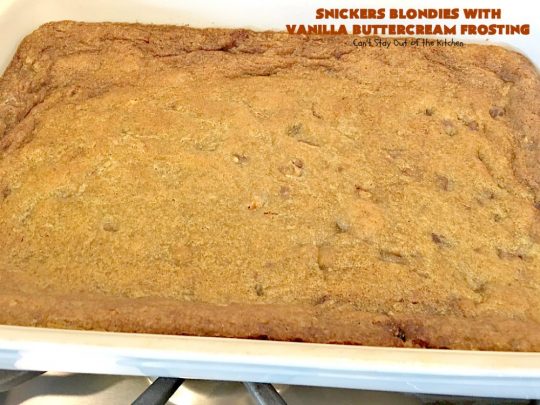 Snickers Blondies with Vanilla Buttercream Frosting | Can't Stay Out of the Kitchen | these outrageous #brownies are divine! The frosting is oh, so heavenly. One bite and you'll be drooling! #dessert #snickers #chocolate