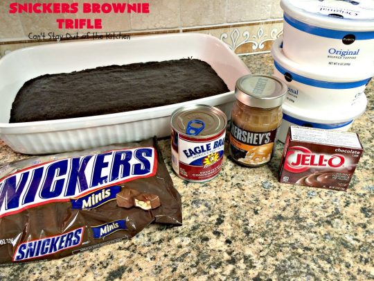 Snickers Brownie Trifle | Can't Stay Out of the Kitchen | this rich & decadent dessert is filled with homemade #brownies, #Snickers bars, #chocolate pudding & #caramel sauce. It's the perfect #dessert for the #holidays, #Christmas, #ValentinesDay or special occasions. 
