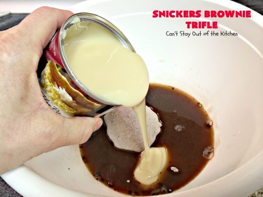 Snickers Brownie Trifle | Can't Stay Out of the Kitchen | this rich & decadent dessert is filled with homemade #brownies, #Snickers bars, #chocolate pudding & #caramel sauce. It's the perfect #dessert for the #holidays, #Christmas, #ValentinesDay or special occasions. 