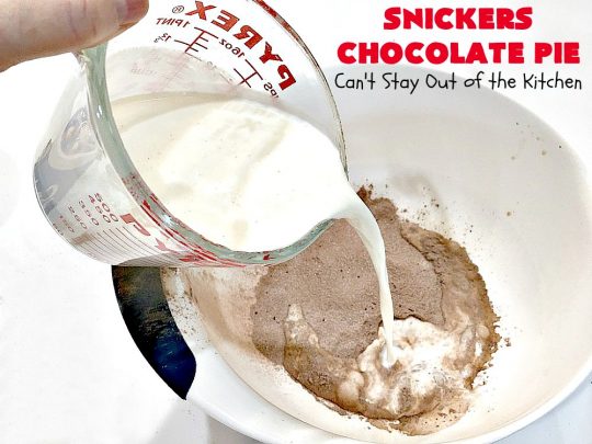 Snickers Chocolate Pie | Can't Stay Out of the Kitchen | this is the ultimate in a rich, decadent & divine #dessert. The fluffy #chocolate texture is filled with #Snickers candy bars. This 5-ingredient #recipe is the perfect #ChocolatePie for #holidays or company. #caramel #pie #PeanutButter #SnickersChocolatePie #ChocolateDessert #HolidayDessert #SnickersDessert