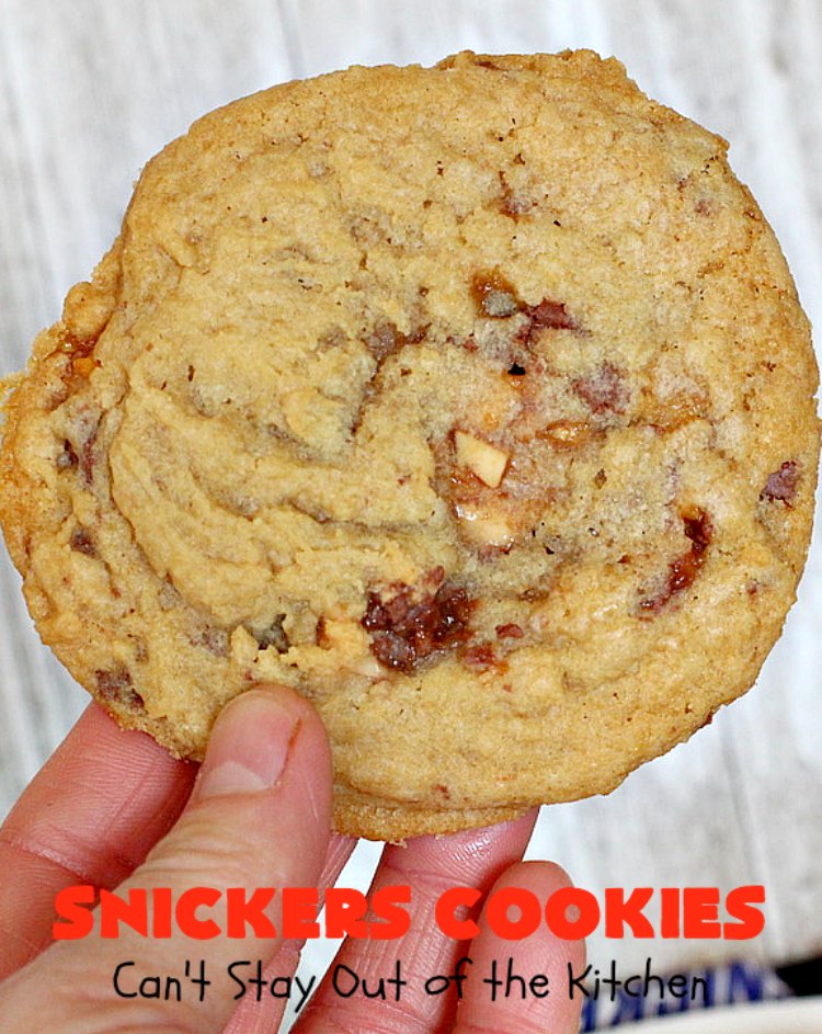 Snickers Cookies | Can't Stay Out of the Kitchen | these #cookies are so irresistible. They're made with original #SnickersBars so they're filled with #chocolate, #caramel & #peanuts. Every bite will have you drooling. Great for potlucks, #tailgating parties or any special occasion. #dessert #holiday #Snickers #HolidayDessert #ChristmasCookieExchange #ChocolateDessert #CaramelDessert #PeanutDessert #SnickersDessert #SnickersCookies