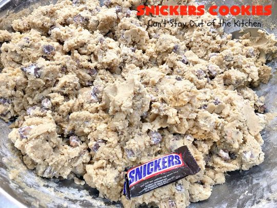 Snickers Cookies | Can't Stay Out of the Kitchen | these #cookies are so irresistible. They're made with original #SnickersBars so they're filled with #chocolate, #caramel & #peanuts. Every bite will have you drooling. Great for potlucks, #tailgating parties or any special occasion. #dessert #holiday #Snickers #HolidayDessert #ChristmasCookieExchange #ChocolateDessert #CaramelDessert #PeanutDessert #SnickersDessert #SnickersCookies
