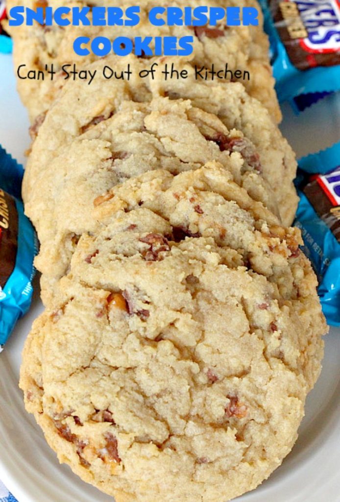 Snickers Crisper Cookies | Can't Stay Out of the Kitchen | these adorable #cookies are made with #SnickersCrisperBars. They're totally spectacular & the ultimate #chocolate cookie sensation. Every bite will knock your socks off! Great for potlucks, #tailgating parties or #holidays. #SnickersBars #SnickersCandyBars #SnickersCrisperCookies #SnickersDessert