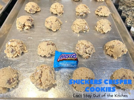 Snickers Crisper Cookies | Can't Stay Out of the Kitchen | these adorable #cookies are made with #SnickersCrisperBars. They're totally spectacular & the ultimate #chocolate cookie sensation. Every bite will knock your socks off! Great for potlucks, #tailgating parties or #holidays. #SnickersBars #SnickersCandyBars #SnickersCrisperCookies #SnickersDessert