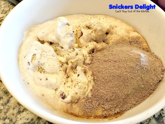 Snickers Delight | Can't Stay Out of the Kitchen | fantastic #icecream #dessert with a graham cracker crust, a #snickers ice cream & #chocolate pudding layer & topped with chopped Snickers bars. This will become your favorite dessert!