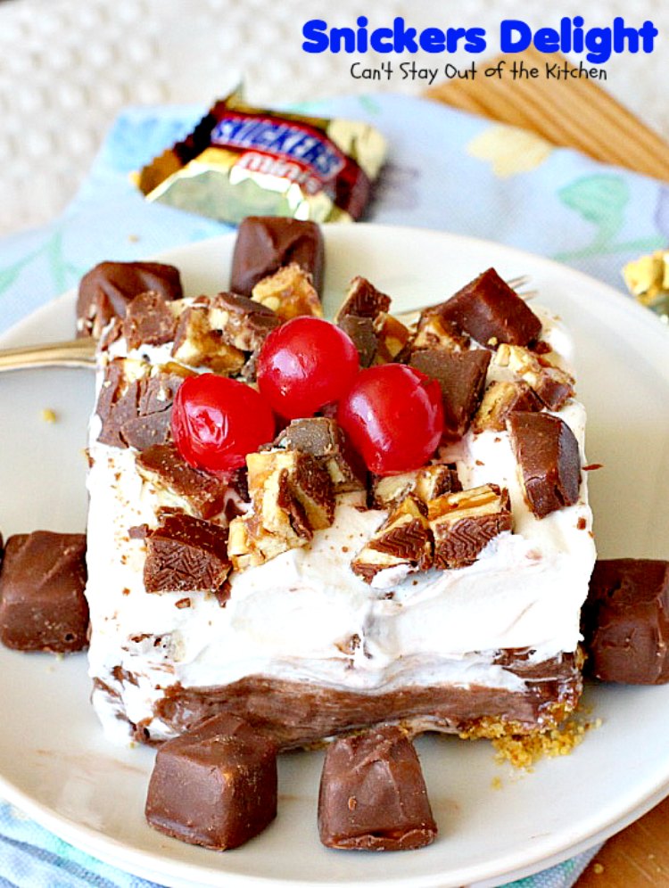 Snickers Delight | Can't Stay Out of the Kitchen | fantastic #icecream #dessert with a graham cracker crust, a #snickers ice cream & #chocolate pudding layer & topped with chopped Snickers bars. This will become your favorite dessert!