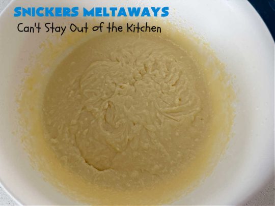 Snickers Meltaways | Can't Stay Out of the Kitchen | these luscious #MeltInYourMouth #cookies are so fabulous they will be gobbled up in no time! They're #SugarCookies with #SnickersBars added to the mix. If you're a #Snickers lover, this lovely #dessert will rock your world! Great for #tailgating parties, potlucks or a #ChristmasCookieExchange. #Peanuts #chocolate #caramel #SnickersMeltaways