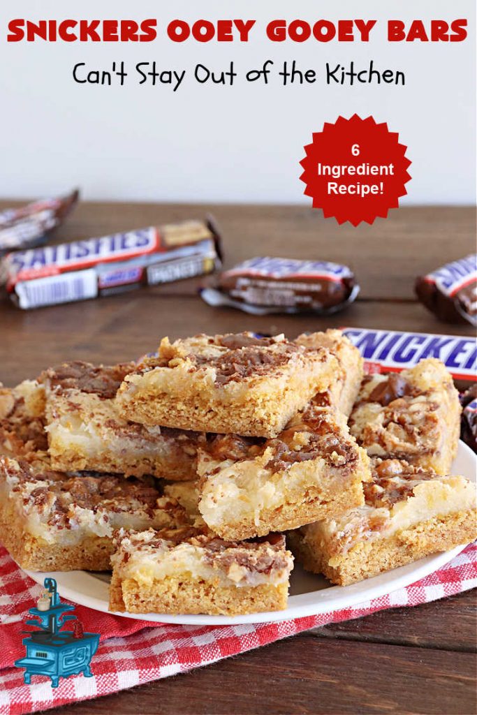 Snickers Ooey Gooey Bars | Can't Stay Out of the Kitchen | these luscious #OoeyGooeyBars contain a #cheesecake layer & they're topped with #SnickersBars for a lovely #chocolate & #PeanutButter flavor that will win over all your family & friends. This 6-ingredient #recipe is perfect for #tailgating parties, potlucks or a #ChristmasCookieExchange. It's easy to whip up & everyone loves them! #holiday #HolidayDessert #SnickersDessert #dessert #brownie #SnickersOoeyGooeyBars