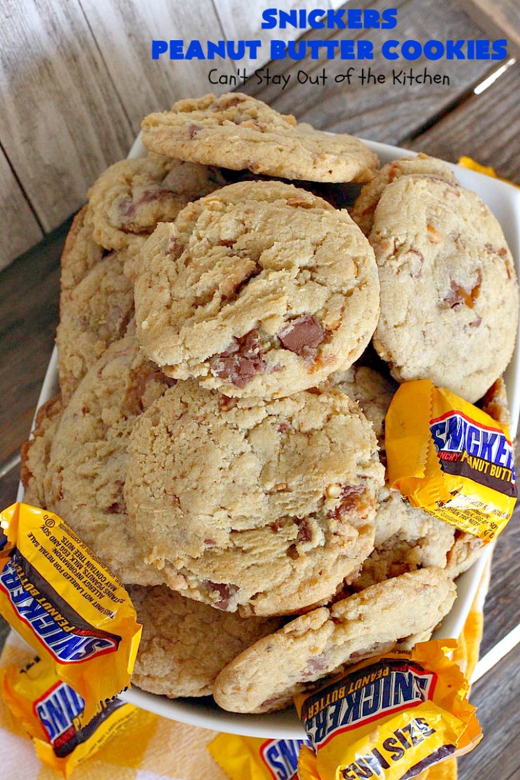 Snickers Peanut Butter Cookies | Can't Stay Out of the Kitchen | these luscious #cookies are loaded with #SnickersPeanutButterBars. The #caramel, #chocolate & #PeanutButter flavors really come through making this one dynamite #dessert. If you enjoy #SnickersCandyBars, you'll rave over this #SnickersDessert. #PeanutButterDessert #ChocolateDessert #HolidayDessert #CaramelDessert #SnickersPeanutButterCookies #tailgating #ChristmasCookieExchange
