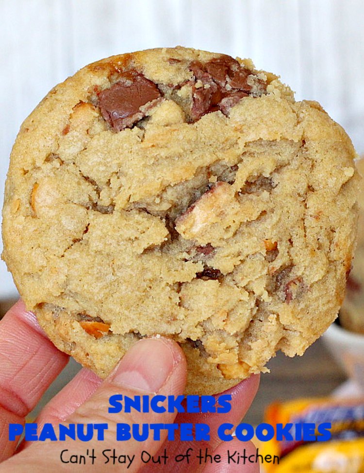 Snickers Peanut Butter Cookies | Can't Stay Out of the Kitchen | these luscious #cookies are loaded with #SnickersPeanutButterBars. The #caramel, #chocolate & #PeanutButter flavors really come through making this one dynamite #dessert. If you enjoy #SnickersCandyBars, you'll rave over this #SnickersDessert. #PeanutButterDessert #ChocolateDessert #HolidayDessert #CaramelDessert #SnickersPeanutButterCookies #tailgating #ChristmasCookieExchange