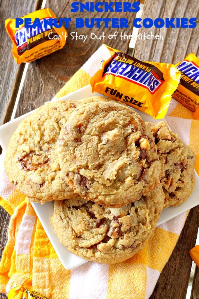 Snickers Peanut Butter Cookies | Can't Stay Out of the Kitchen | these luscious #cookies are loaded with #SnickersPeanutButterBars. The #caramel, #chocolate & #PeanutButter flavors really come through making this one dynamite #dessert. If you enjoy #SnickersCandyBars, you'll rave over this #SnickersDessert. #PeanutButterDessert #ChocolateDessert #HolidayDessert #CaramelDessert #SnickersPeanutButterCookies #tailgating #ChristmasCookieExchange