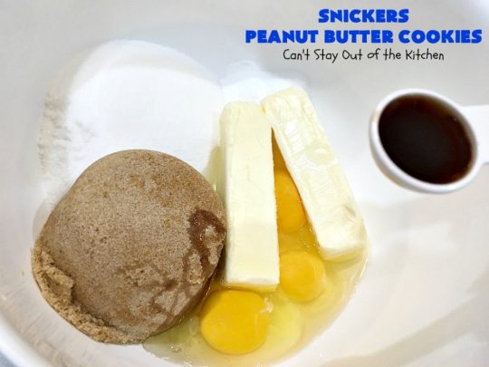 Snickers Peanut Butter Cookies | Can't Stay Out of the Kitchen | these luscious #cookies are loaded with #SnickersPeanutButterBars. The #caramel, #chocolate & #PeanutButter flavors really come through making this one dynamite #dessert. If you enjoy #SnickersCandyBars, you'll rave over this #SnickersDessert. #PeanutButterDessert #ChocolateDessert #HolidayDessert #CaramelDessert #SnickersPeanutButterCookies #tailgating #ChristmasCookieExchange