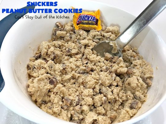 Snickers Peanut Butter Cookies | Can't Stay Out of the Kitchen | these luscious #cookies are loaded with #SnickersPeanutButterBars. The #caramel, #chocolate & #PeanutButter flavors really come through making this one dynamite #dessert. If you enjoy #SnickersCandyBars, you'll rave over this #SnickersDessert. #PeanutButterDessert #ChocolateDessert #HolidayDessert #CaramelDessert #SnickersPeanutButterCookies #tailgating #ChristmasCookieExchange