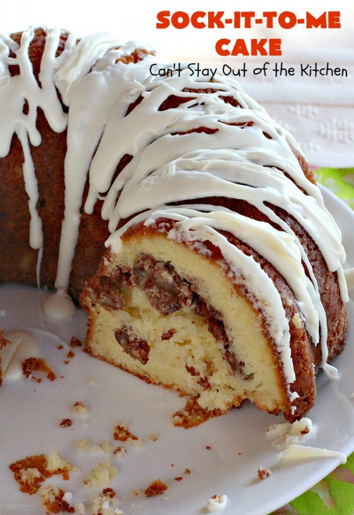 Sock-It-To-Me Cake | Can't Stay Out of the Kitchen | this fantastic #cake will knock your socks off! It has a lovely #pecan streusel filling in the middle & it's glazed with vanilla icing. We serve this as a #coffeecake for #breakfast or for #dessert. #Brunch #Holiday #cinnamon #HolidayBreakfast #SockItToMeCake