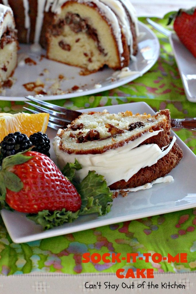 Sock-It-To-Me Cake | Can't Stay Out of the Kitchen | this fantastic #cake will knock your socks off! It has a lovely #pecan streusel filling in the middle & it's glazed with vanilla icing. We serve this as a #coffeecake for #breakfast or for #dessert. #Brunch #Holiday #cinnamon #HolidayBreakfast #SockItToMeCake 