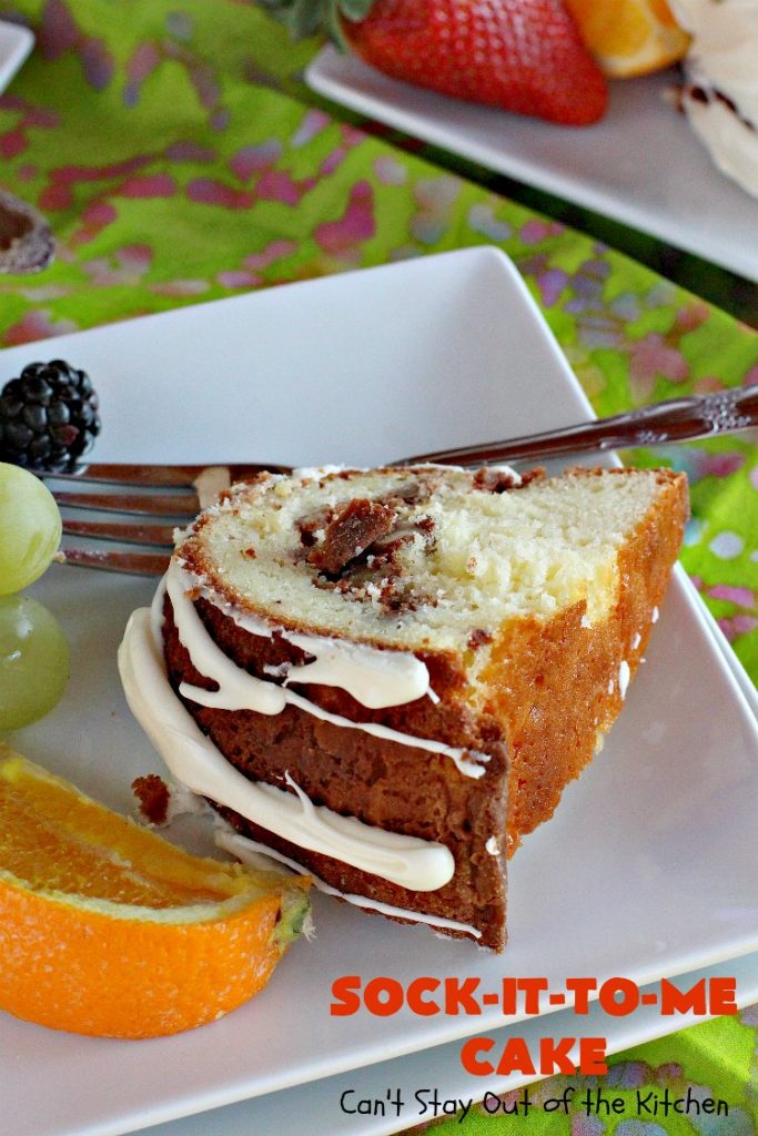 Sock-It-To-Me Cake | Can't Stay Out of the Kitchen | this fantastic #cake will knock your socks off! It has a lovely #pecan streusel filling in the middle & it's glazed with vanilla icing. We serve this as a #coffeecake for #breakfast or for #dessert. #Brunch #Holiday #cinnamon #HolidayBreakfast #SockItToMeCake 