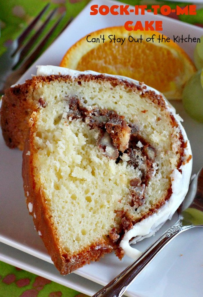 Sock-It-To-Me Cake | Can't Stay Out of the Kitchen | this fantastic #cake will knock your socks off! It has a lovely #pecan streusel filling in the middle & it's glazed with vanilla icing. We serve this as a #coffeecake for #breakfast or for #dessert. #Brunch #Holiday #cinnamon #HolidayBreakfast #SockItToMeCake 